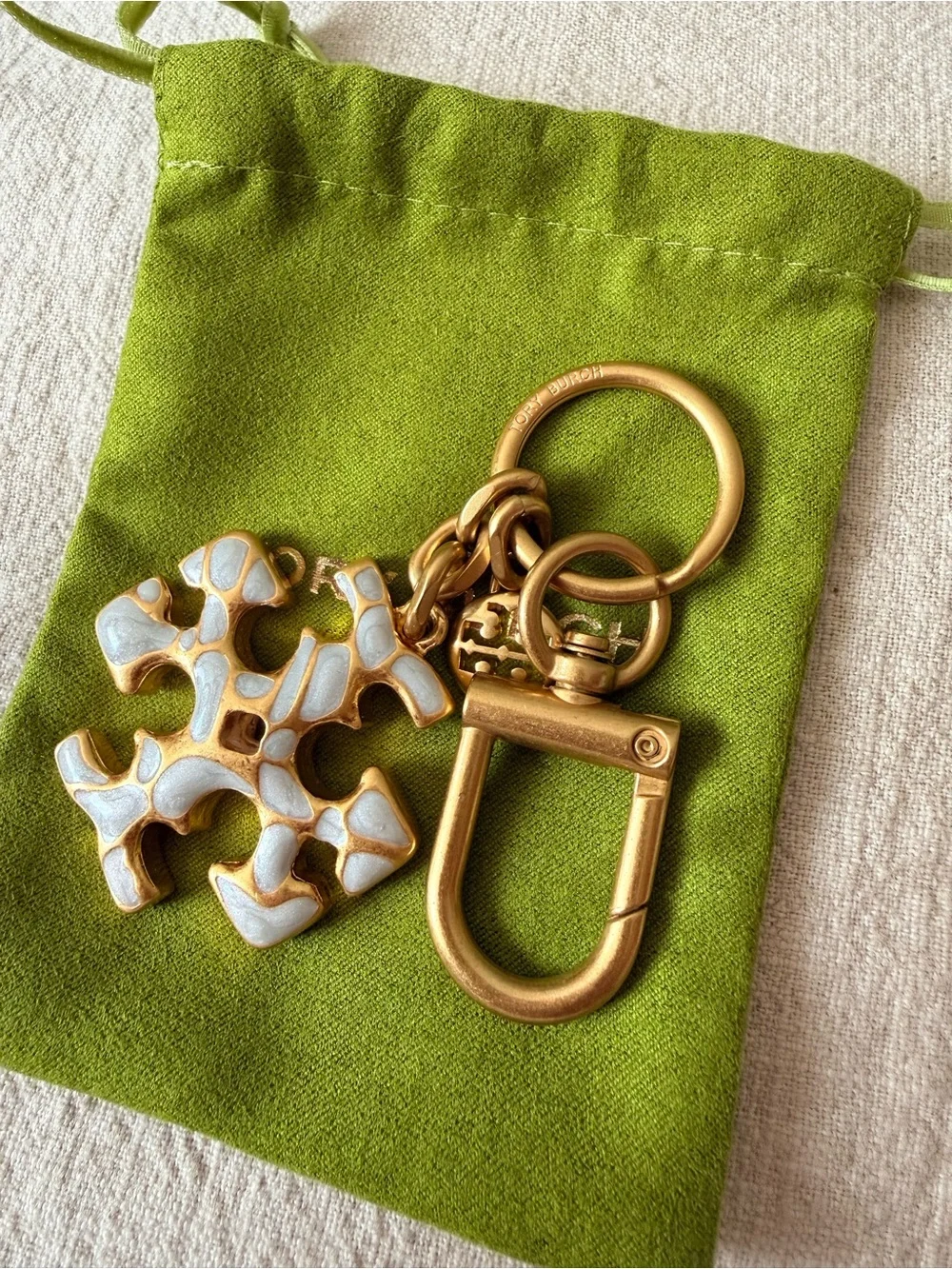 Tory Burch Gold-Tone Key / Bag Charm with White Enamel Logo